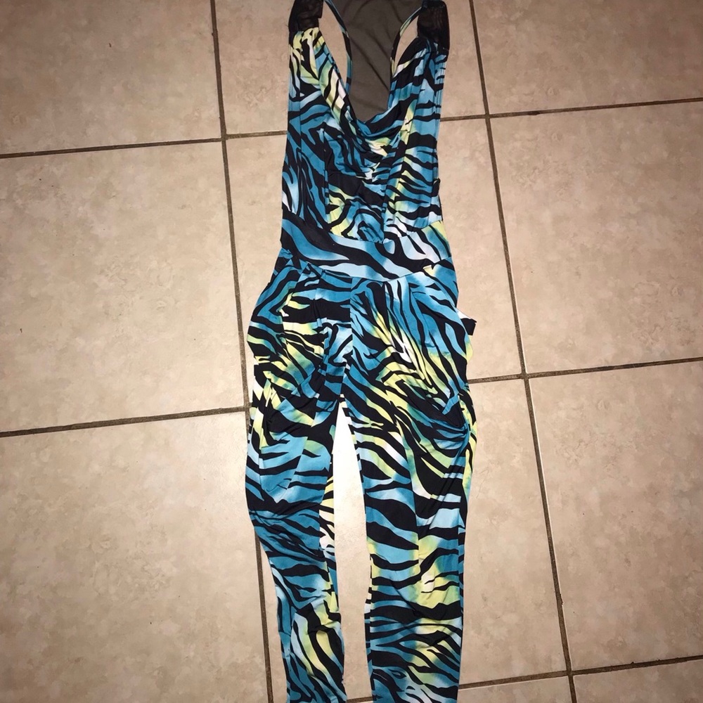 Multi color romper. Worn once.